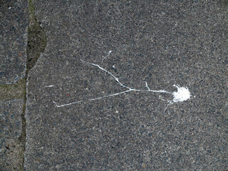 White paint marks on the tarmac