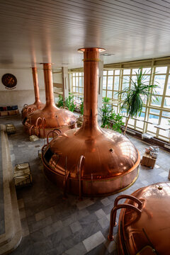 Ceske Budejovice - July 13 2024: Budweiser Budvar Brew House Interior with Copper Wort Pans or Brew Kettles for Beer Production.