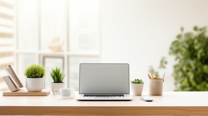 Obraz premium A high-resolution photo of a clean and modern office workspace with a laptop and notepad, soft natural light.