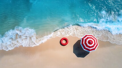 Obraz premium Aerial View of Pristine Shoreline with Red Umbrella and Waves