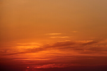 Bright pink sunset sky with cirrus clouds