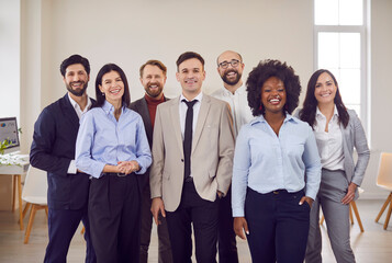 Portrait of a happy and diverse group of business people in an office. The multinational team of...