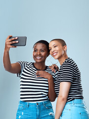 Friends, woman and happy for selfie in studio on grey background for fashion, clothes and trends. People, girls and smile or satisfied for social media or online post and profile picture for style