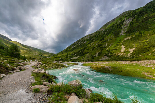 Dramatic Zamser Bach: Stormy Alpine Landscape