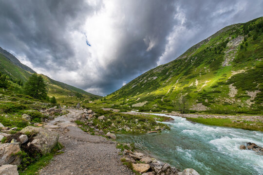Dramatic Zamser Bach: Stormy Alpine Landscape