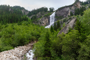 Majestic Mountain Waterfall: Cascading Waters Through Rugged Cliffs (Zemmgrund, AT)