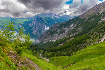 Fototapeta premium Hiking Adventure: Conquer the Mountain Peaks (Amatschonjoch, Nenzing, Austria)