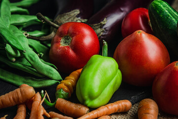 Fresh vegetables on a black background. Set of different vegetables