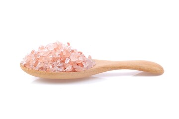 Himalaya pink salt close up on white background.