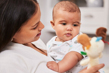 Woman, baby and bonding in nursery for growth, development and family home in playing with toy. Mother, happy and comfort with infant, smile or hug for support, love and wellness in health or nurture