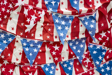 Fototapeta premium Patriotic Decor and Symbols for American Holidays – Flags, Bunting, Festive Decorations for Labor Day, Fourth of July, Memorial Day