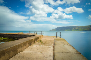 The pier at Waterfoot n County Antrim, Northern Ireland 