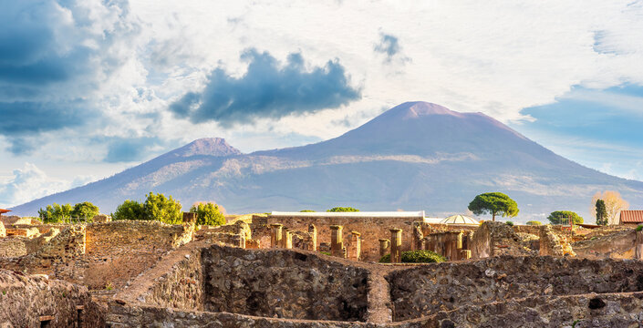 beautiful landscape from Pompeii ancient archeological excavation to Vesuvius volcano  and amazing cloudy cky on background