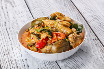 Thai red spicy curry with chicken