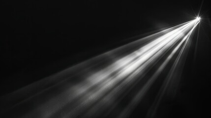 Close-up of a focused beam of light isolated on black background