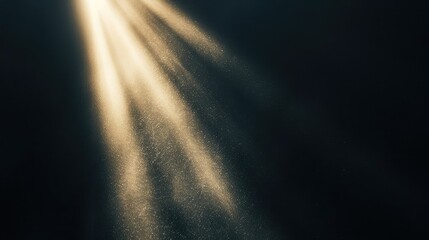 Close-up view of a narrow light beam on a dark black background