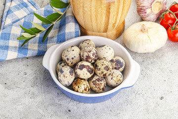 Raw quail eggs in the bowl