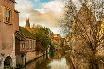 The Eure River at Chartres and at background the domes of our lady basilica, France.