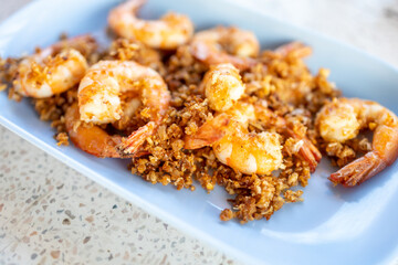 Top view of Fried River Prawn with Garlic and Pepper, focus selective