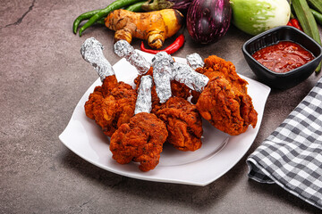 Indian cuisine glazed chicken lollipop