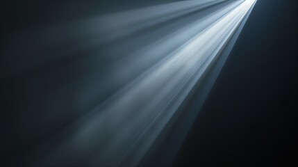 Single beam of light cutting through the blackness, close-up view
