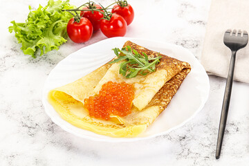 Russian pancake with red caviar