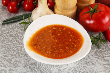 Hot tomato soup with diced chicken