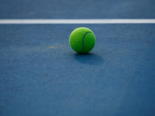 Tennis ball on the tennis court course