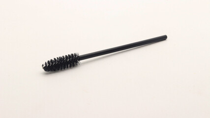 Black eyelash comb