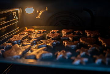 School cookies in the oven, in the process of cooking