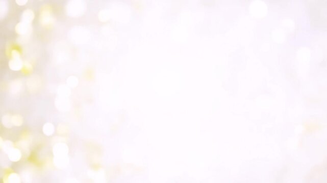 abstract blurred beautiful glowing white color golden and yellow gradient background with double exposure bokeh light concept for wedding card design or presentation or other blur 4k video
