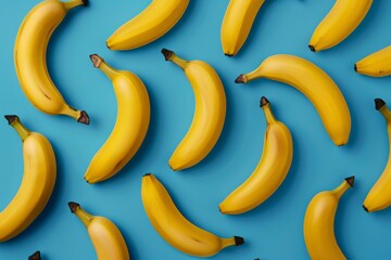 This image showcases a pattern of yellow bananas arranged on a bright blue background, highlighting the vibrant color and playful arrangement of the bananas.