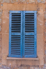 old window with shutters