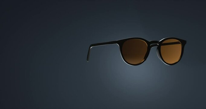 Animated fashion sunglasses on nice dark background with shadow.
