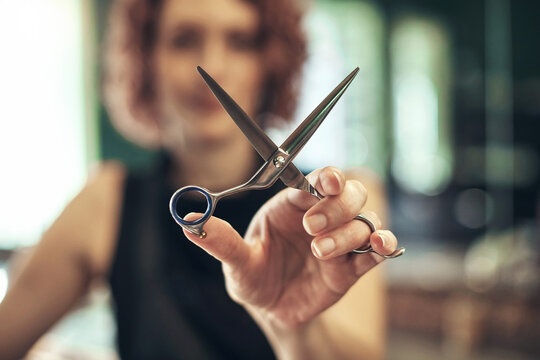 Hairdresser, woman or closeup of hand with scissors for haircut, haircare or hairstyle appointment. Beauty salon, professional stylist or equipment for grooming treatment, ready to cut or change hair