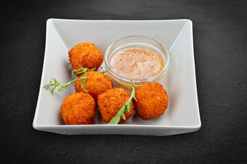 Fried cheese balls with honey-mustard sauce