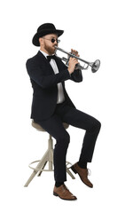 Handsome musician playing trumpet on white background © New Africa