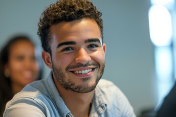 Fototapeta premium Happy male student smiling during class at the university