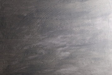 Fondo con texture materica dipinta a tempera di colore grigio; spazio per testo