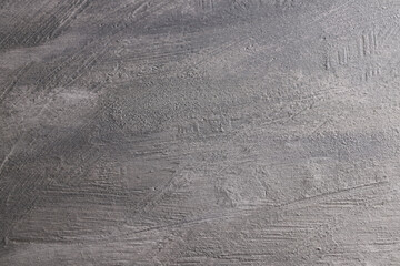 Fondo con texture materica dipinta a tempera di colore grigio; spazio per testo