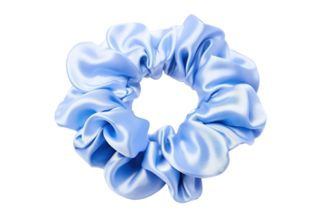 A Delicate Sky Blue Silk Scrunchie Resting on a White Background on a Clear PNG or White Background.
