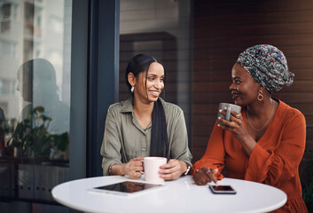 Talking, happy and women with coffee at cafe for conversation, chatting or lunch break. Relax, discussion and female friends with cup for caffeine, cappuccino and beverage at outdoor restaurant