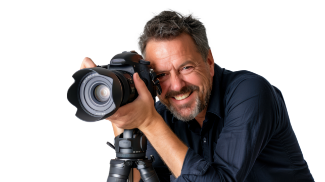 Smiling man photographer is taking images photo with dslr camera