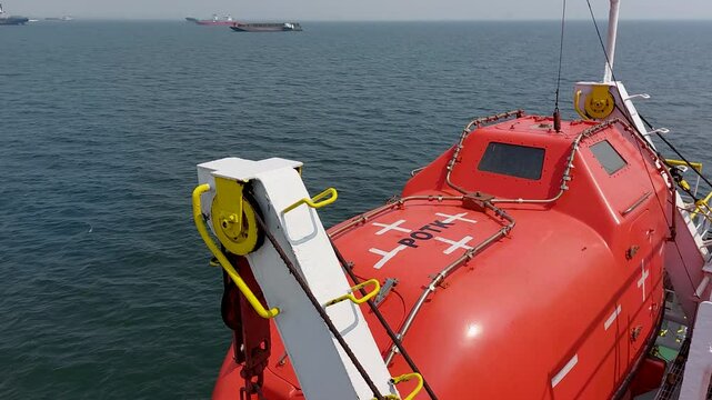 Multifunctional orange enclosed lifeboat, tanker lifeboat