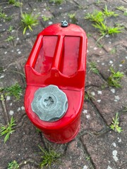 red iron canister for gasoline