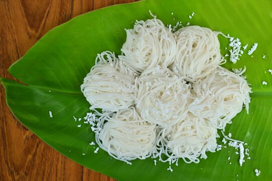 Idiyappam, Noolappam, rice flour noodles, string hopper served in banana leaf