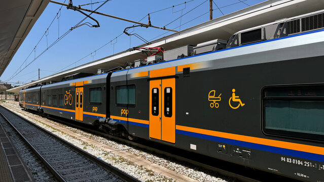 Trenitalia Pop electric train in an Italian railway station. FS ETR.103-104 electric train