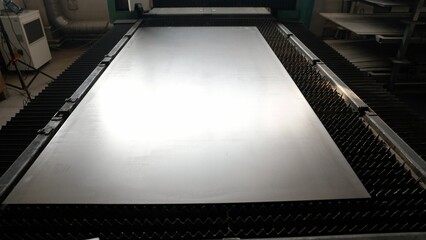 Metal sheet metal, in production. Steel plate, steel sheet. Metal sheets, industrial metal pile,...