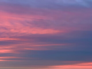 Vibrant pink and purple sunset sky.