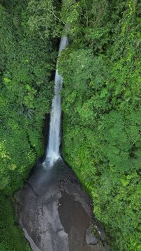 Aerial video over Air Terjun Melanting Waterfall - Bali